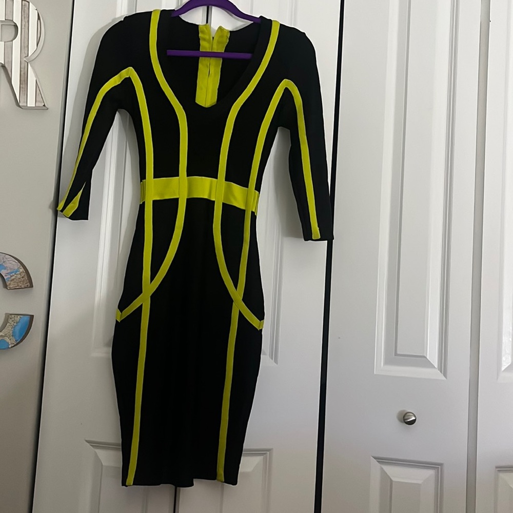 This dress is from a boutique I got in miami a few years ago. Worn once, Size 3